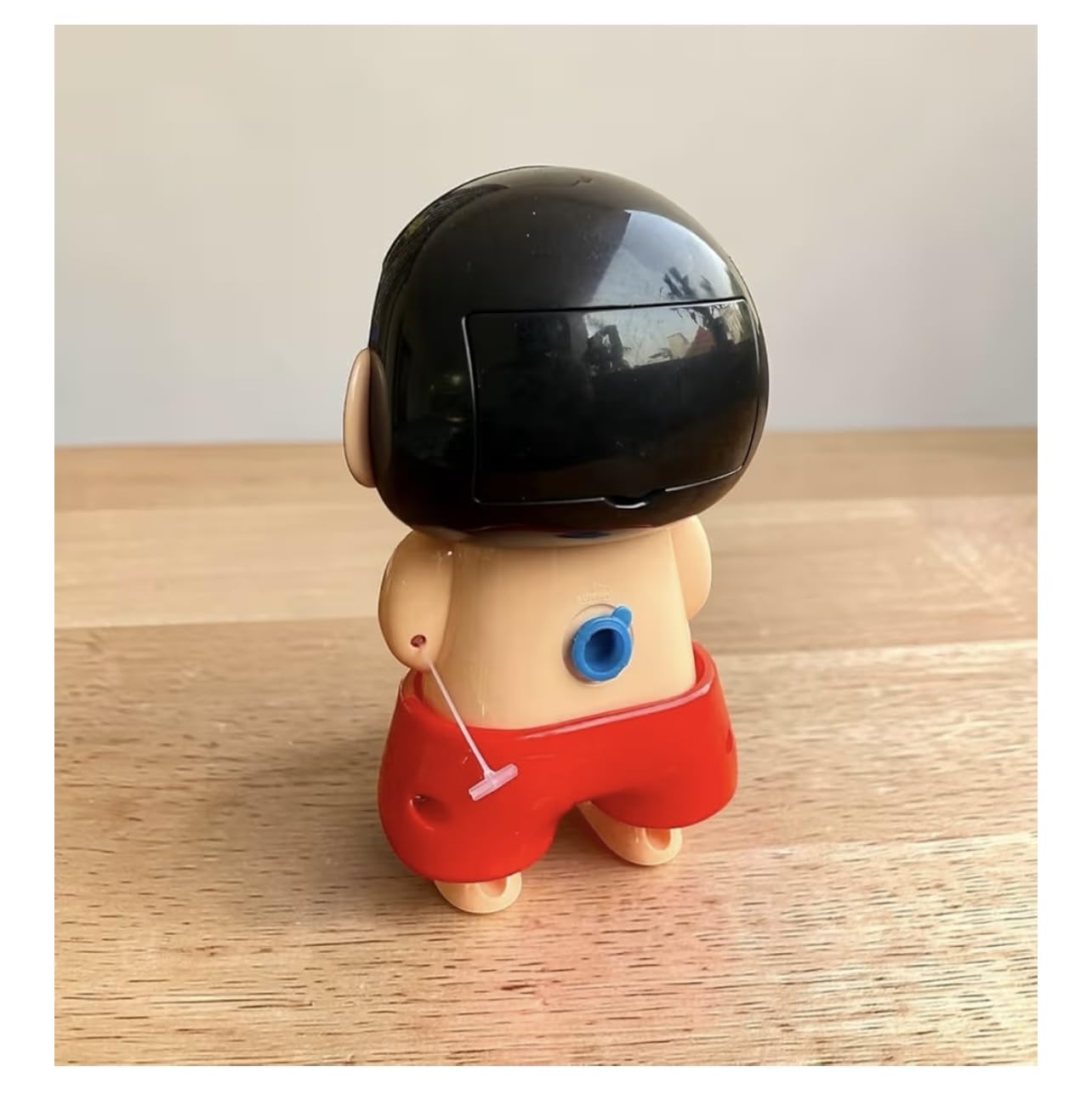 Degomart Shinchan Water Spray Squeeze Prank Toy 4.3in Red